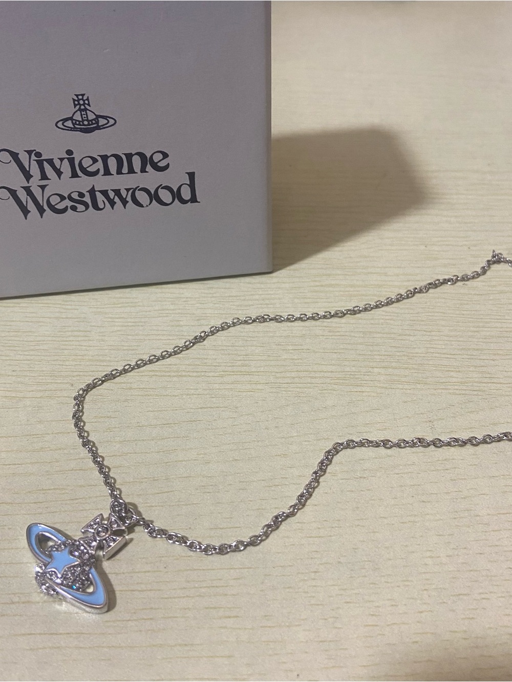 Vivienne Westwood Silver Necklace with Light Blue Orb Charm